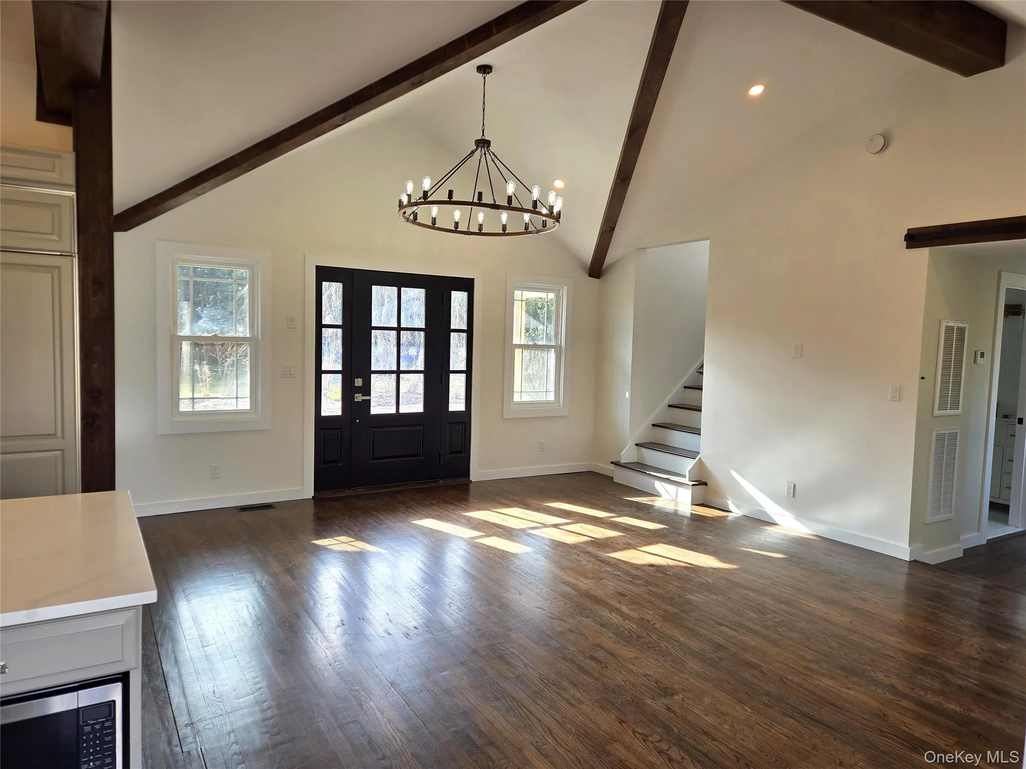 Another View Of The Shaker Style Front Door & Entrance Into The Great Room - Stunning Living Room & Chef's Custom Kitchen. Another View Of The Shaker Style Front Door & Entrance Into The Great Room - Stunning Living Room & Chef's Custom Kitchen.