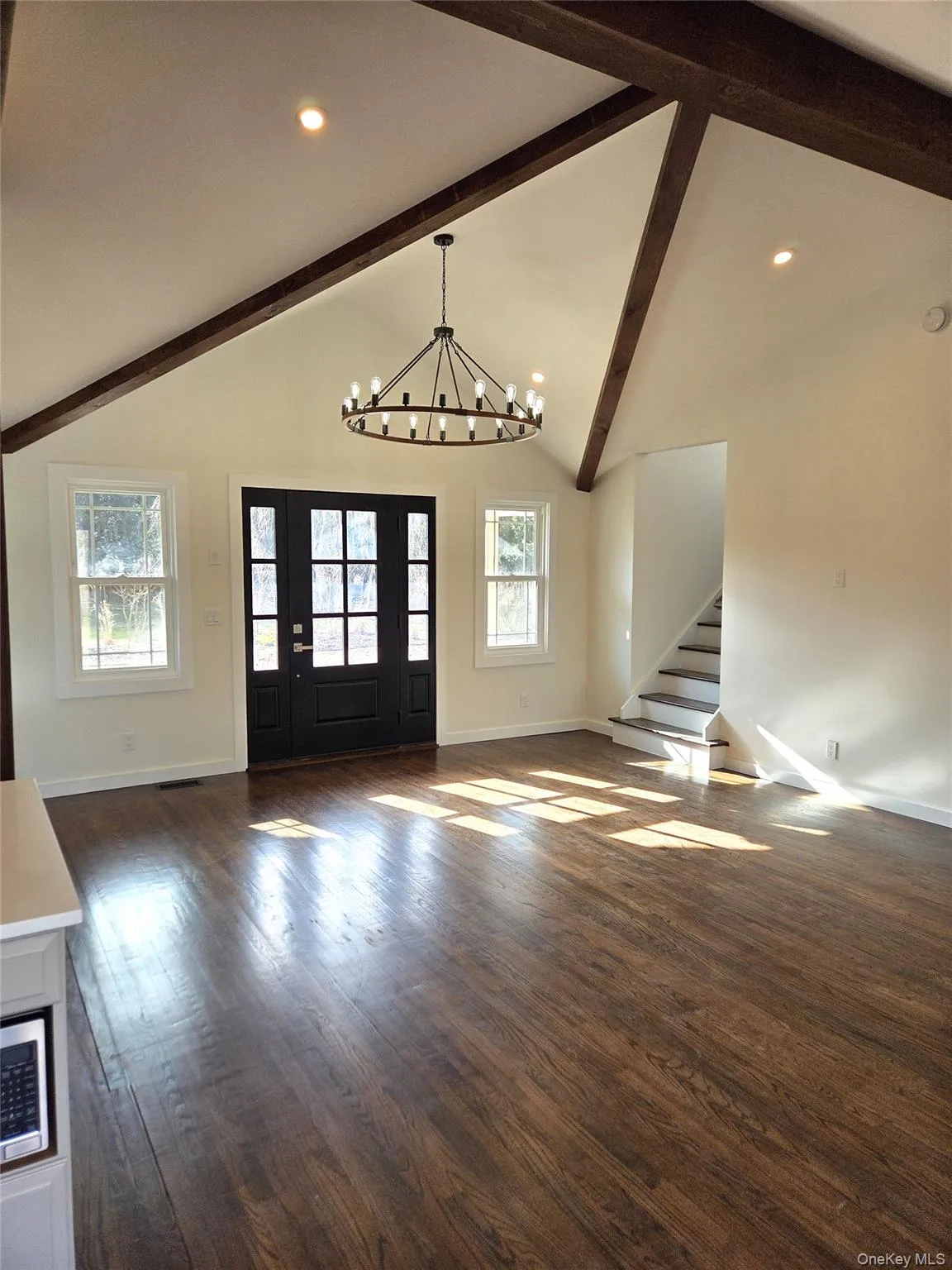 View Of The Front Entry Into The Stunning Great Room - Living Room & Chef's Custom Kitchen. View Of The Front Entry Into The Stunning Great Room - Living Room & Chef's Custom Kitchen.