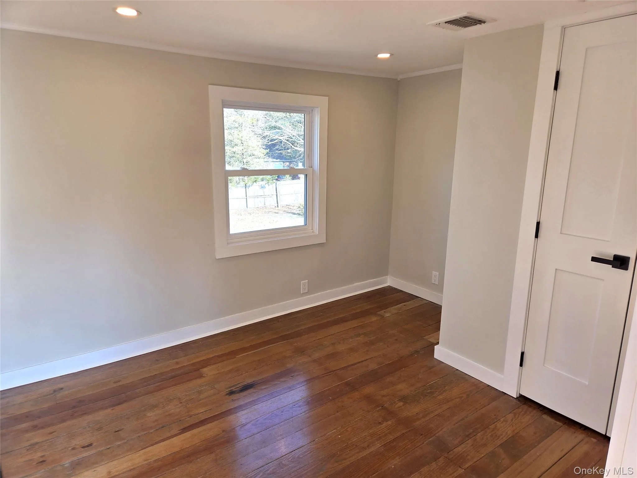 The Third Bedroom Offers A Large Window For Natural Light, Original Wide Plank Wood Floors, Recessed Lighting & A Double Sized Closet. The Third Bedroom Offers A Large Window For Natural Light, Original Wide Plank Wood Floors, Recessed Lighting & A Double Sized Closet.