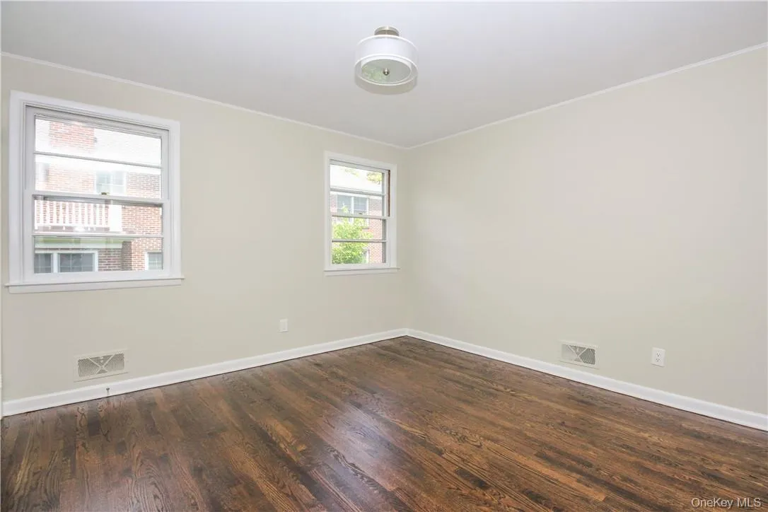 Bedroom with double closet and single closet Bedroom with double closet and single closet