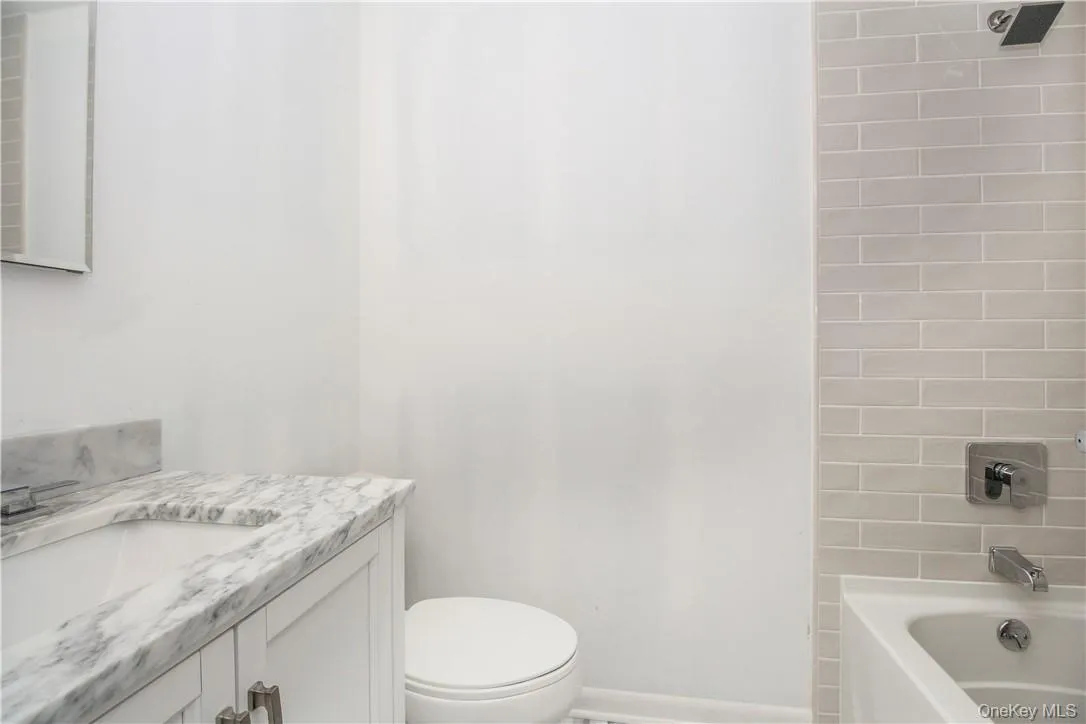 Full Hallway bathroom, marble floor, renovated 2019 Full Hallway bathroom, marble floor, renovated 2019