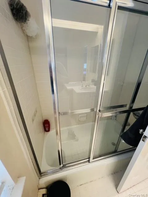 Bathroom with tile patterned floors Bathroom with tile patterned floors