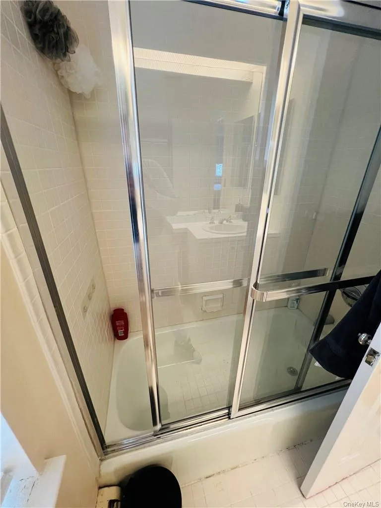 Bathroom with tile patterned floors Bathroom with tile patterned floors