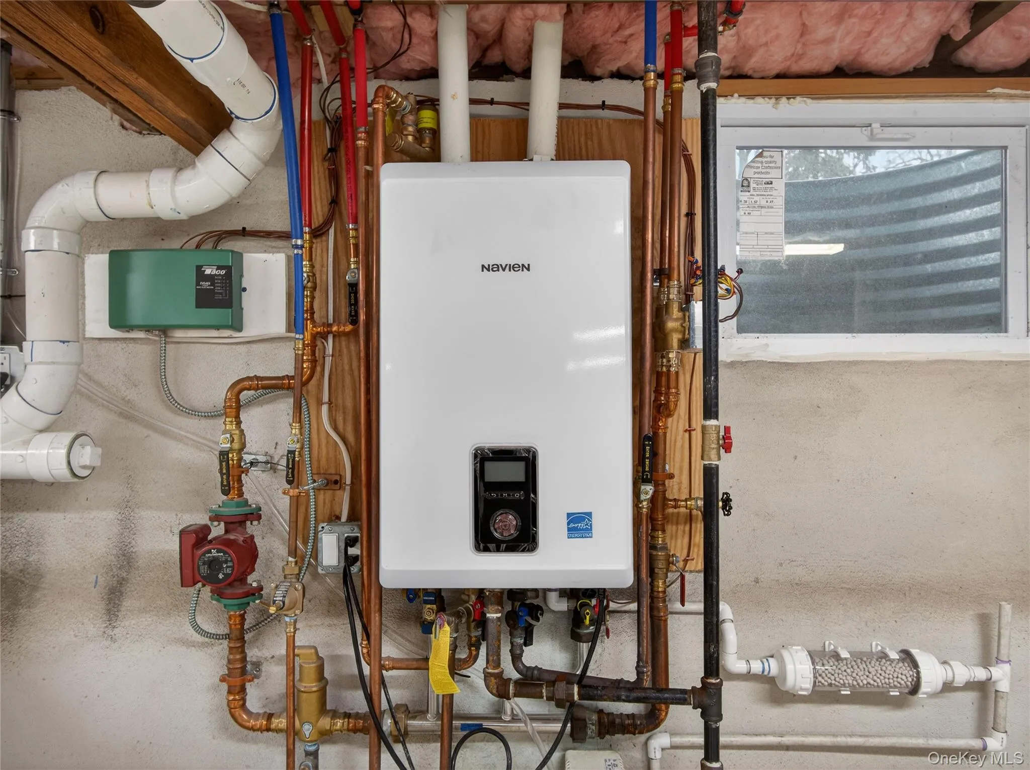 Utilities featuring water heater Utilities featuring water heater