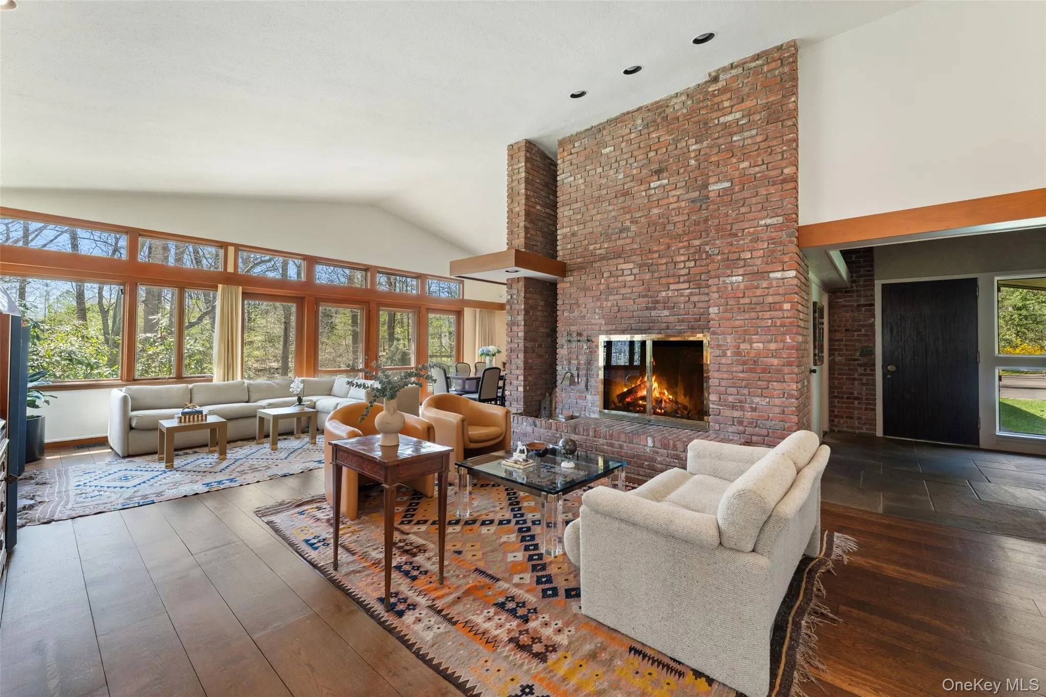 Enjoy soaring ceilings and walls of windows Enjoy soaring ceilings and walls of windows
