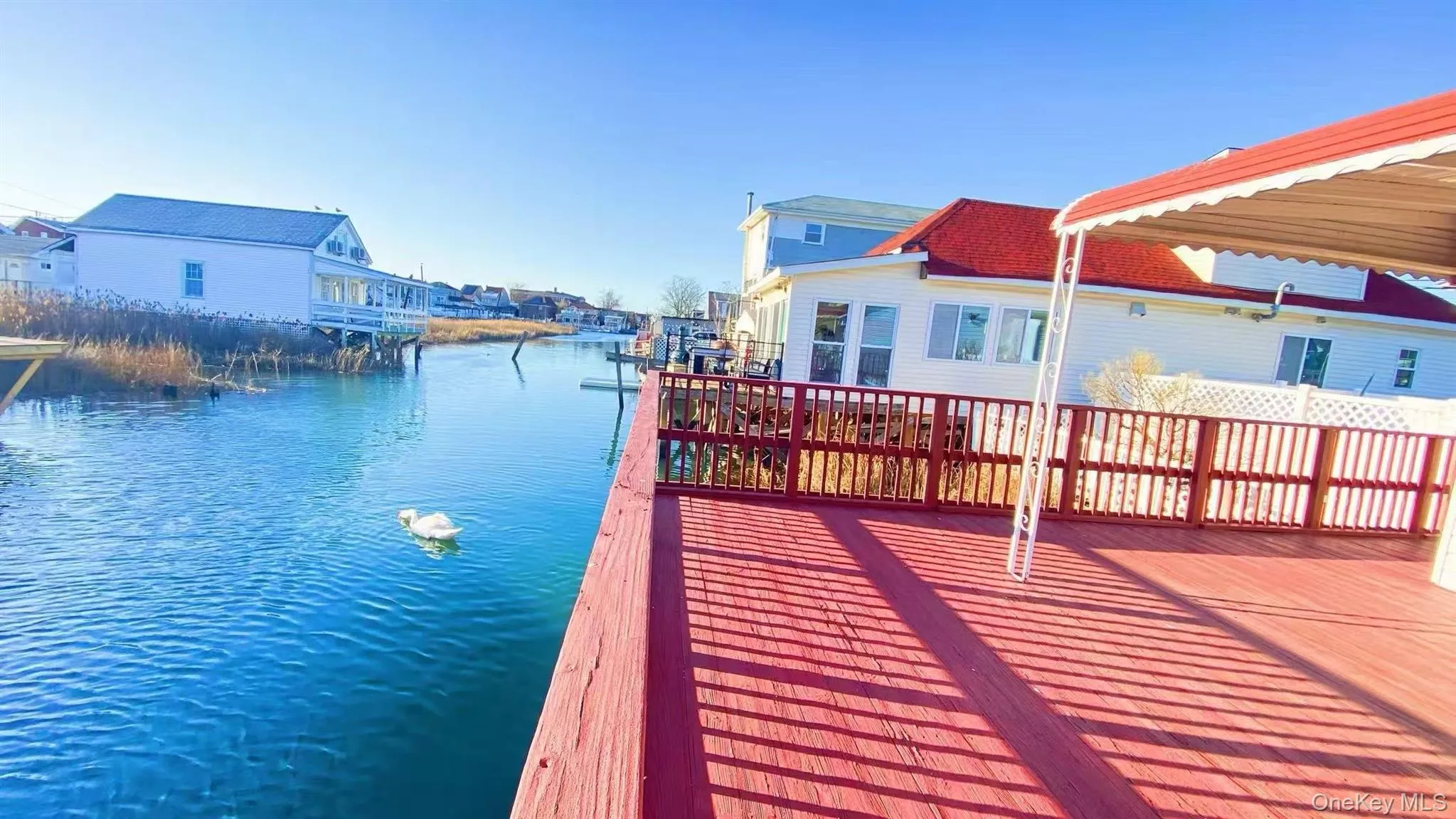 Dock with a deck with water view Dock with a deck with water view