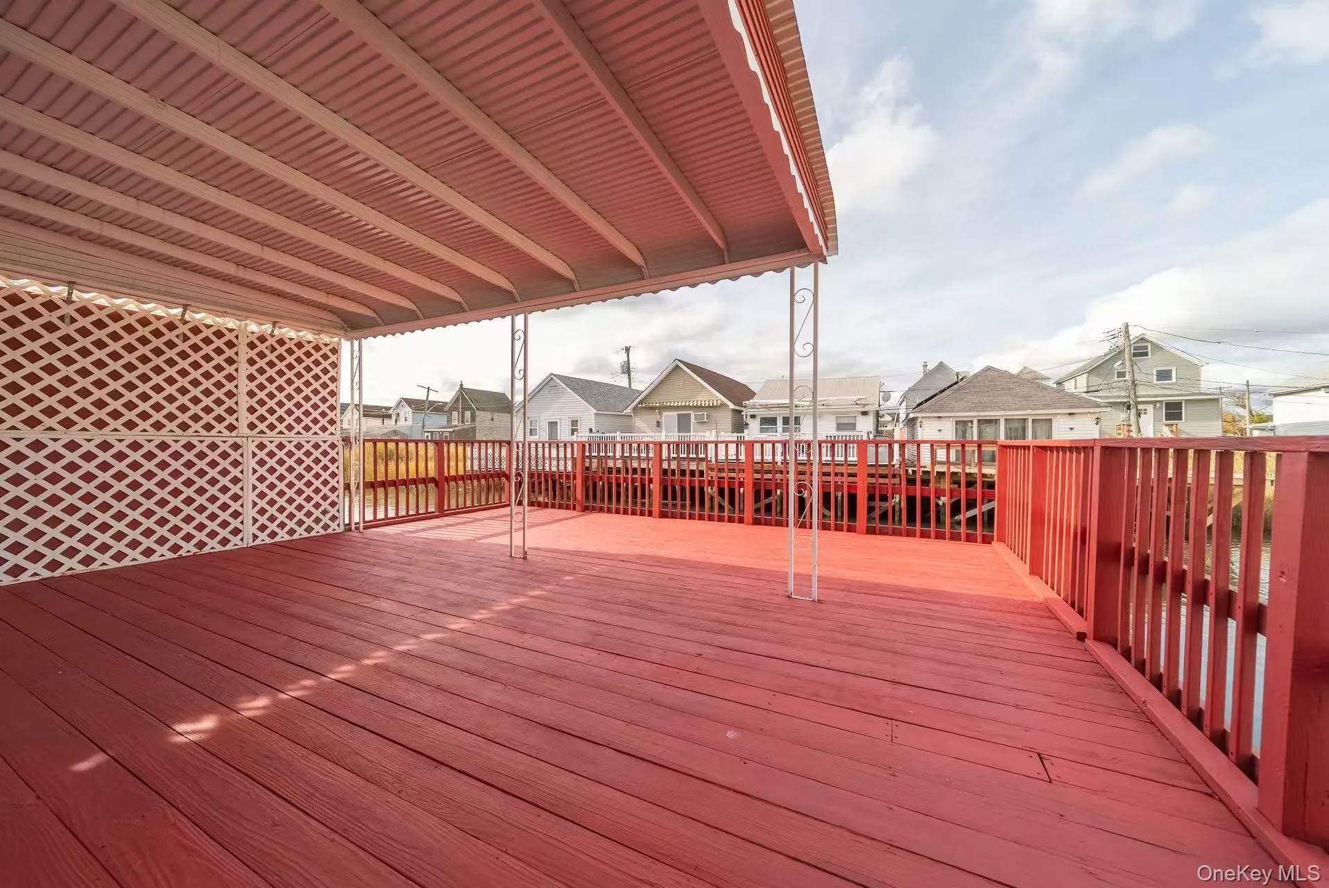 Wooden deck with a residential view Wooden deck with a residential view