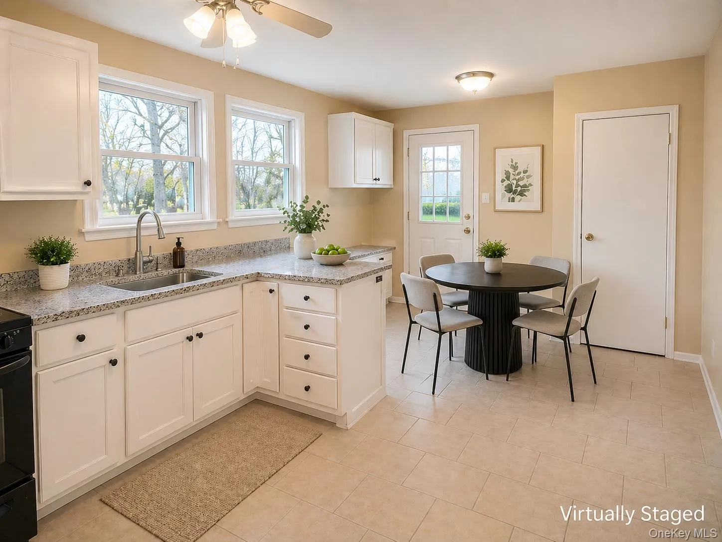Eat-in kitchen with modern finishes, dining space and washer dryer hookups Eat-in kitchen with modern finishes, dining space and washer dryer hookups