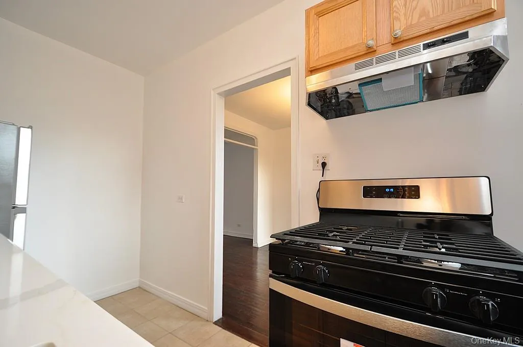 Kitchen has Quarts counters and stainless steel appliances Kitchen has Quarts counters and stainless steel appliances