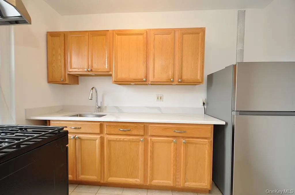 Kitchen has Quarts counters and stainless steel appliances Kitchen has Quarts counters and stainless steel appliances