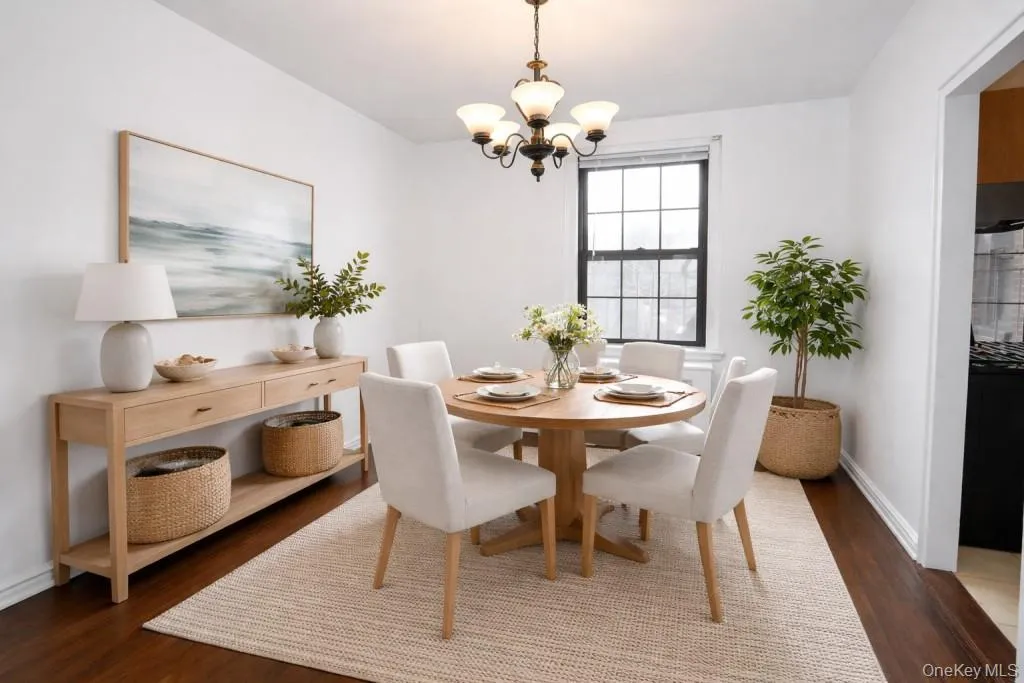 Photo visually staged. The separate dining room opens to the living room and can be used as a home office. The dining room is approx 10'-11" x 9'-4". Photo visually staged. The separate dining room opens to the living room and can be used as a home office. The dining room is approx 10'-11" x 9'-4".
