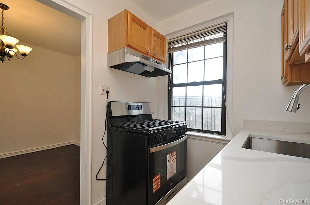 Kitchen has Quarts counters and stainless steel appliances Kitchen has Quarts counters and stainless steel appliances