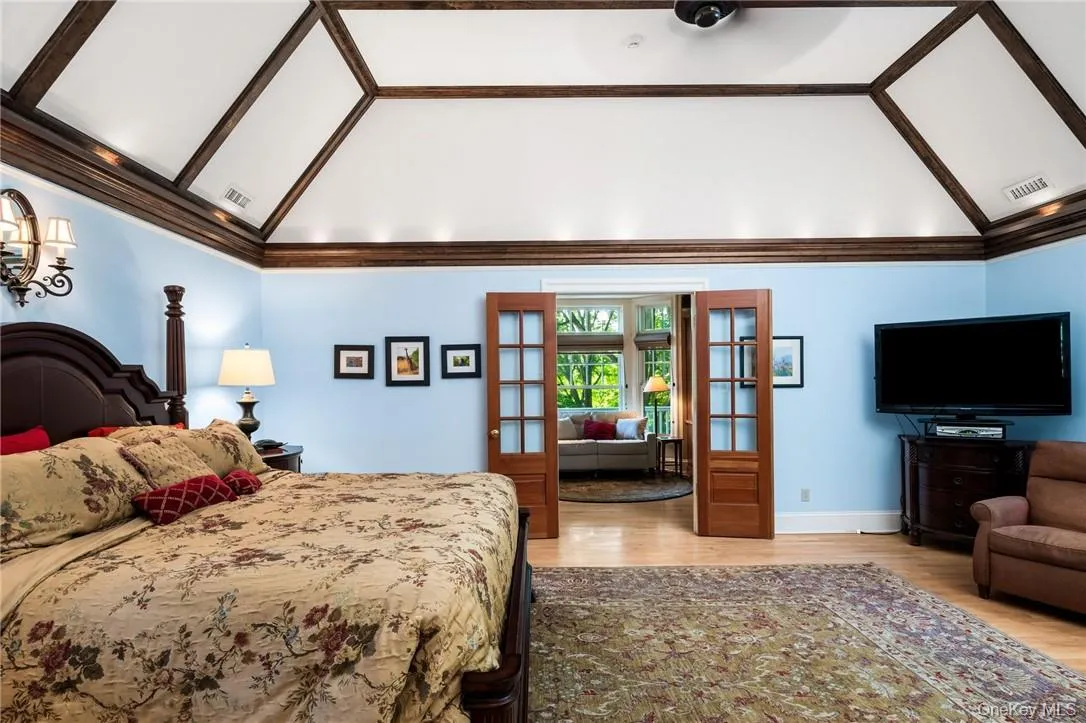 Primary Bedroom w/ view into Home Office/Library Primary Bedroom w/ view into Home Office/Library