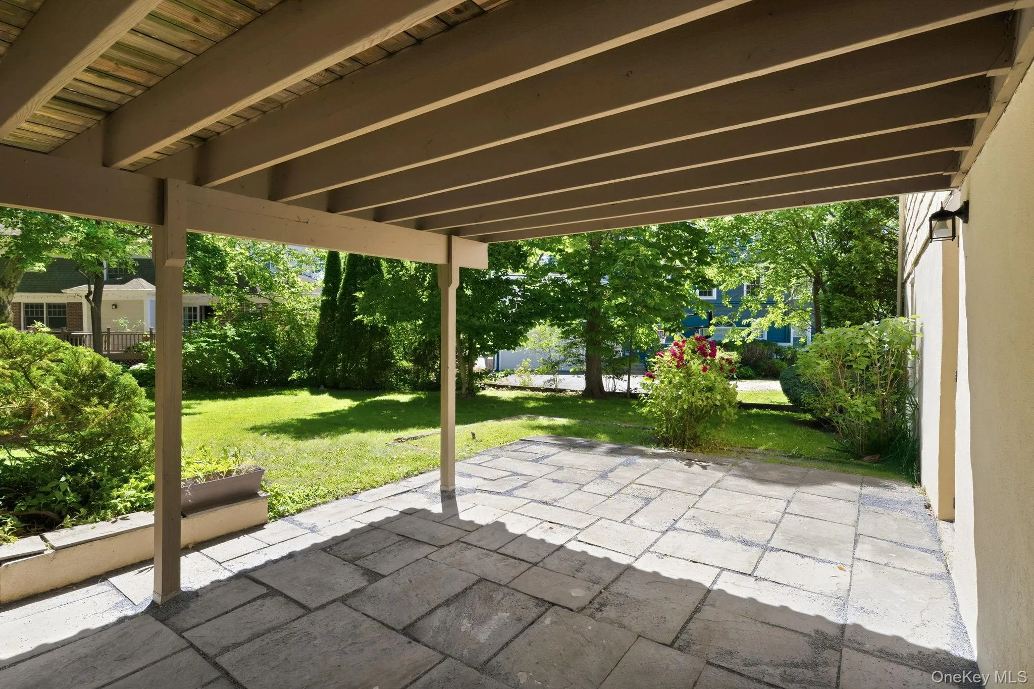 A shaded outdoor retreat perfect for relaxing all season long. A shaded outdoor retreat perfect for relaxing all season long.