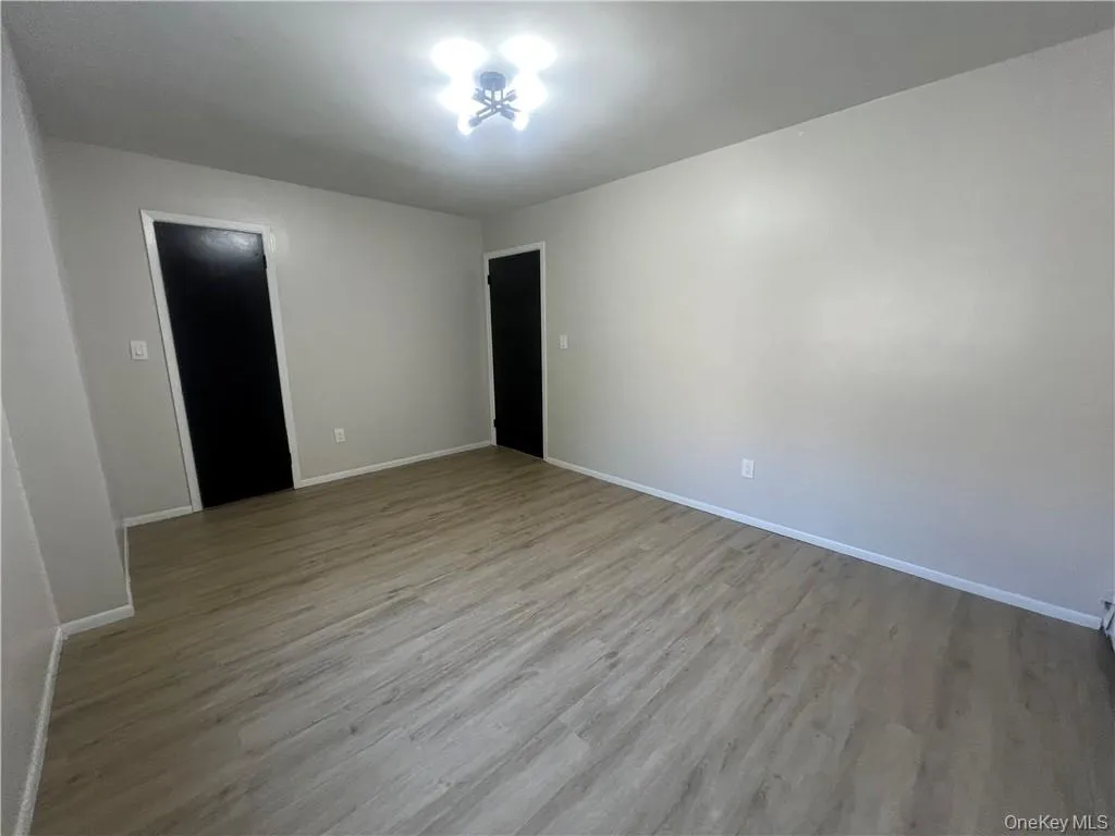 Empty room with light wood-type flooring Empty room with light wood-type flooring