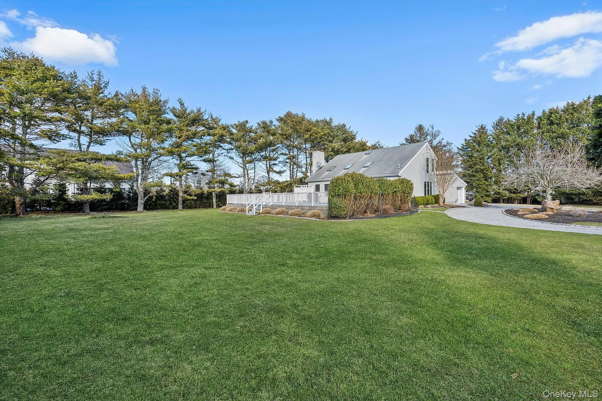Side yard offers generous lawn space and an inground pool Side yard offers generous lawn space and an inground pool