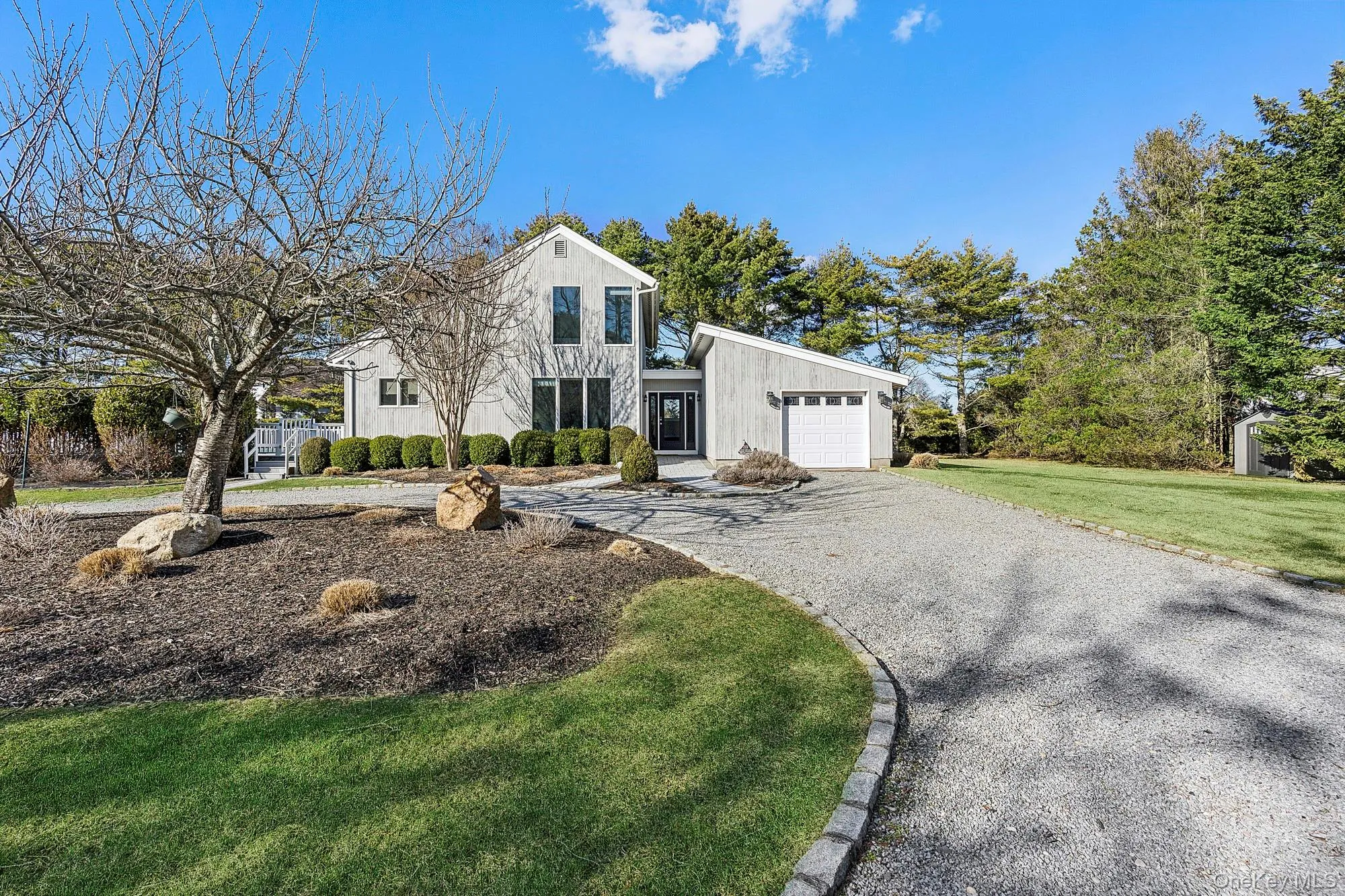 Premier south-of-the-highway residence with an extended private driveway and distinguished curb appeal. Premier south-of-the-highway residence with an extended private driveway and distinguished curb appeal.