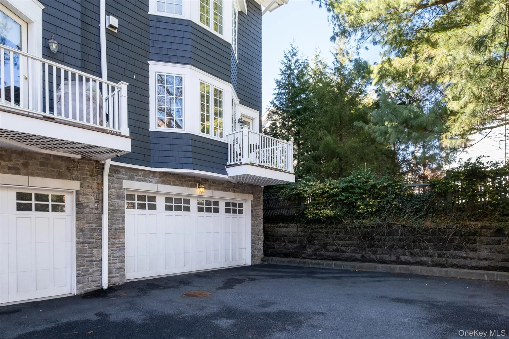 Two car garage. A third spot is available across the shared back driveway. Two car garage. A third spot is available across the shared back driveway.
