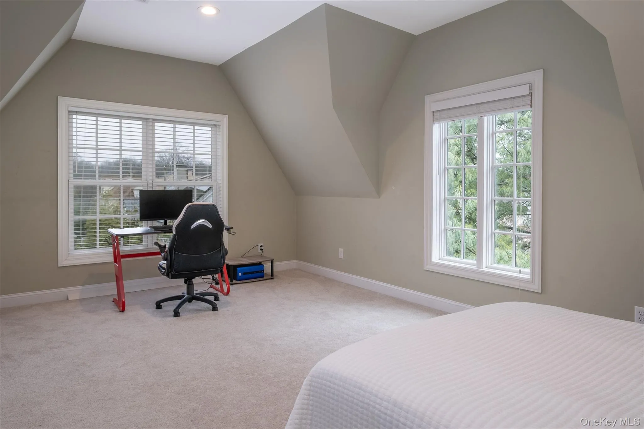 Top floor alternate primary. Tree top views and a walk-in closet. Top floor alternate primary. Tree top views and a walk-in closet.