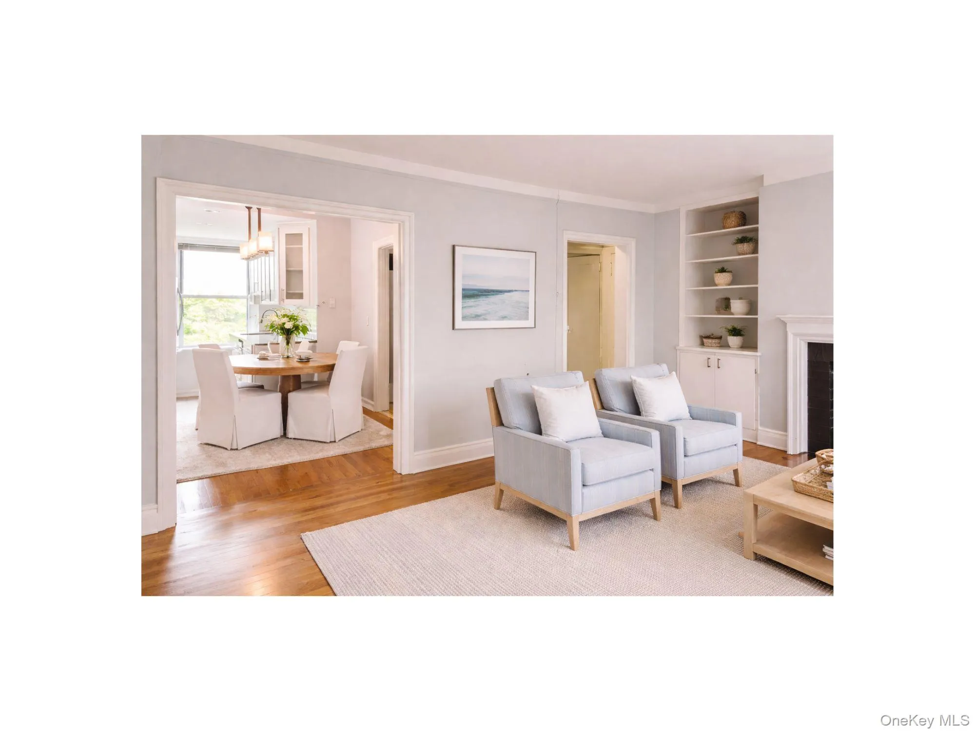 Virtually Staged Living Room looking into Dining Area and Kitchen. Virtually Staged Living Room looking into Dining Area and Kitchen.