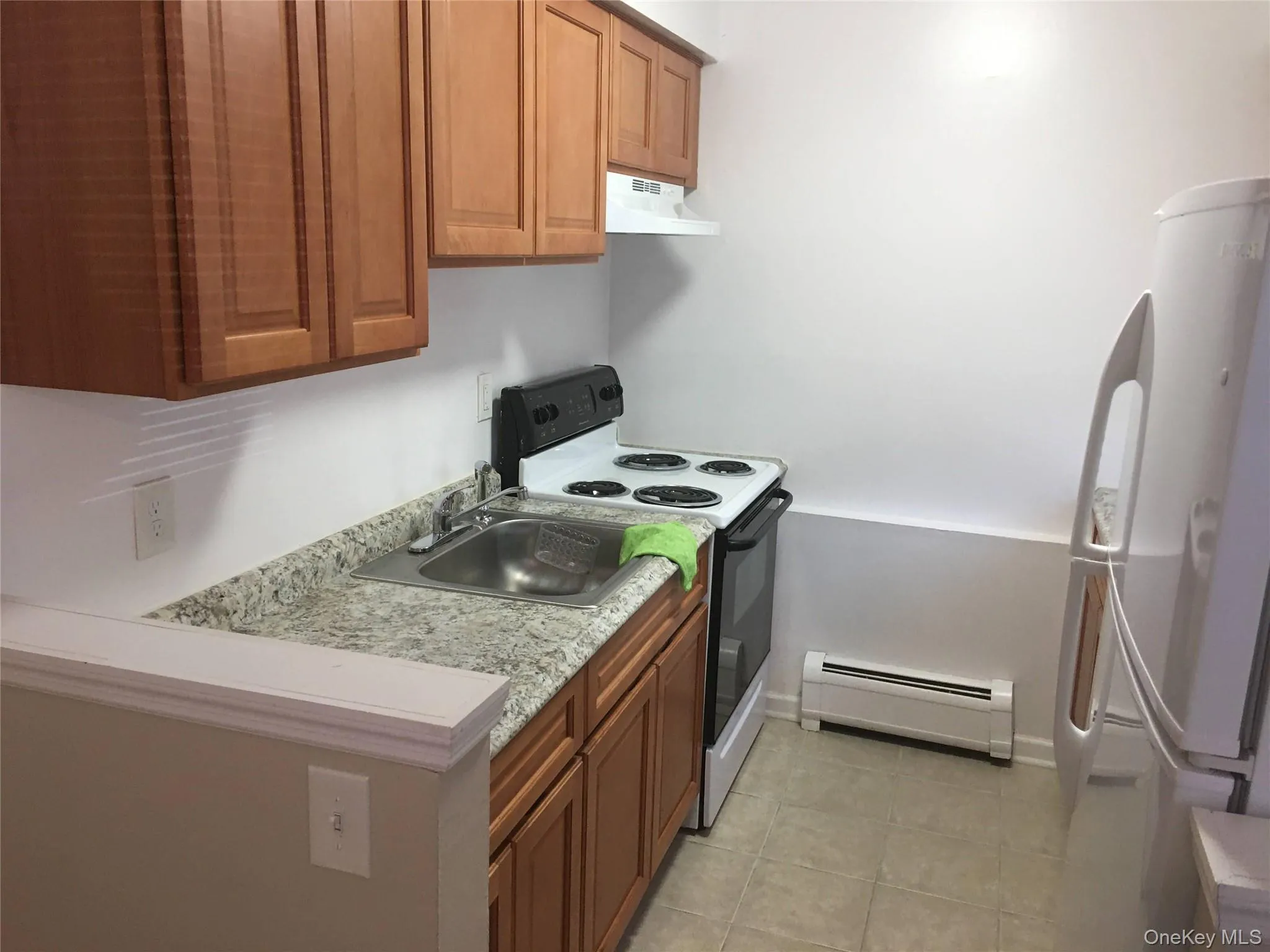 Brand new stove, newer cabinets and frig! Brand new stove, newer cabinets and frig!