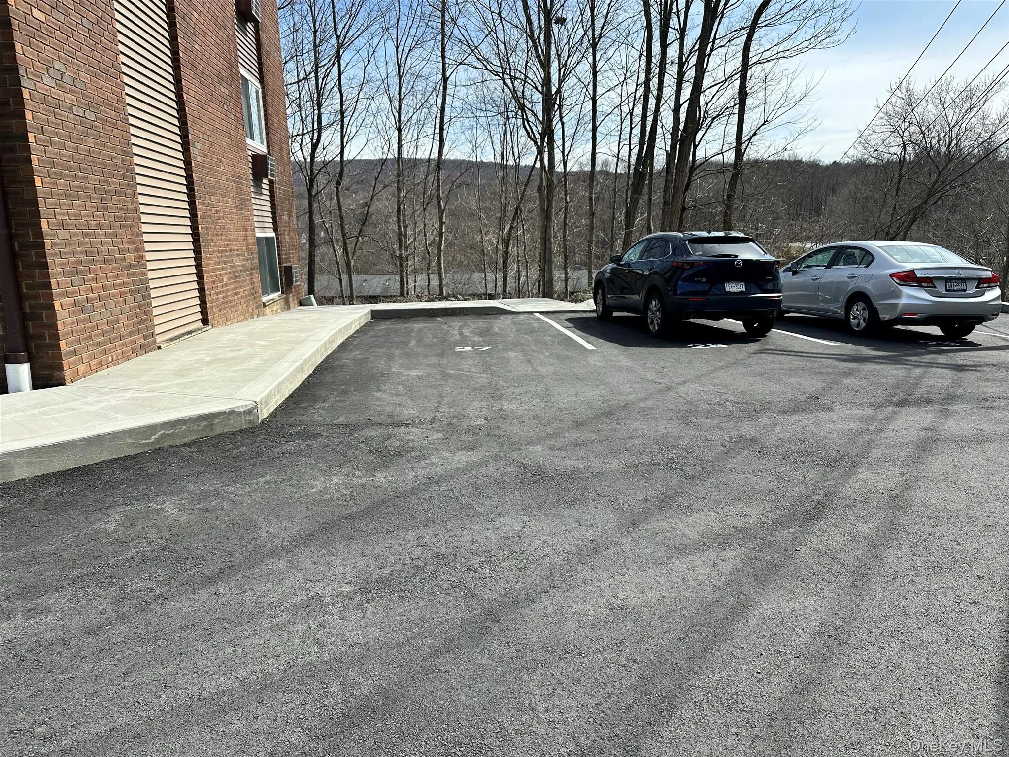 Your parking space is right next to the building. Great for carrying groceries Your parking space is right next to the building. Great for carrying groceries