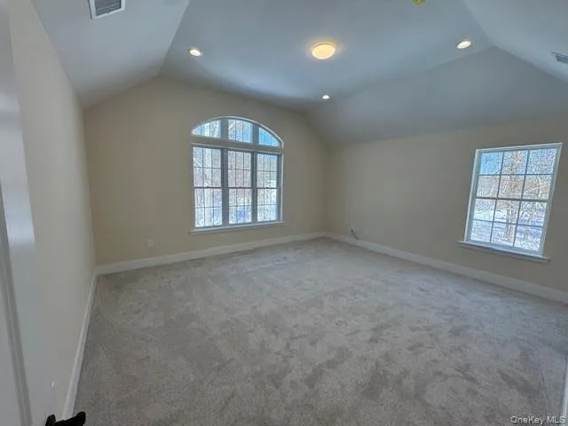featuring carpet flooring, recessed lighting and tray ceiling featuring carpet flooring, recessed lighting and tray ceiling