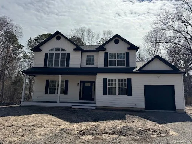 View of front of property with a porch, a garage, and driveway(option) View of front of property with a porch, a garage, and driveway(option)