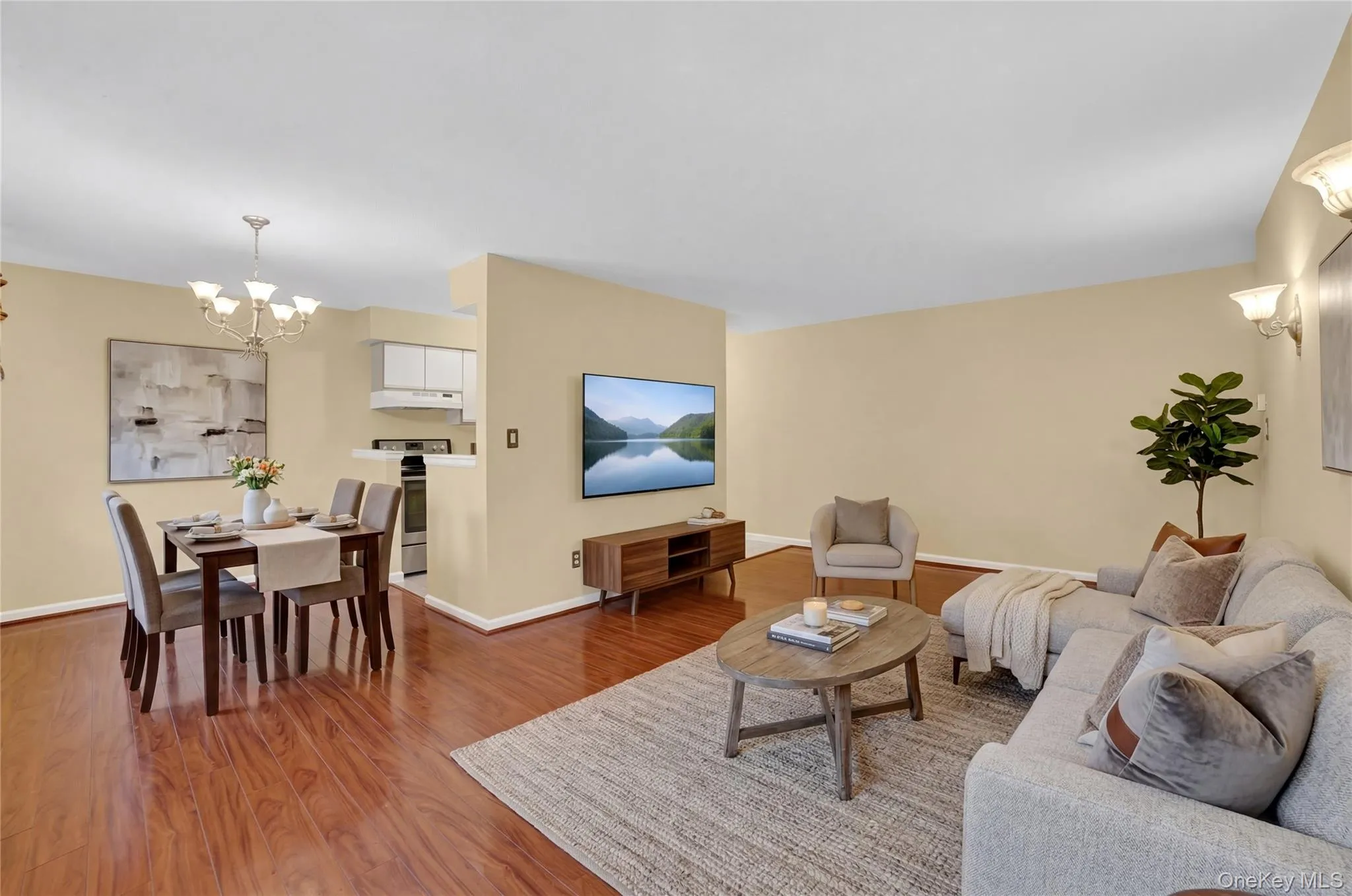 Virtual staged living and dining room area. Virtual staged living and dining room area.