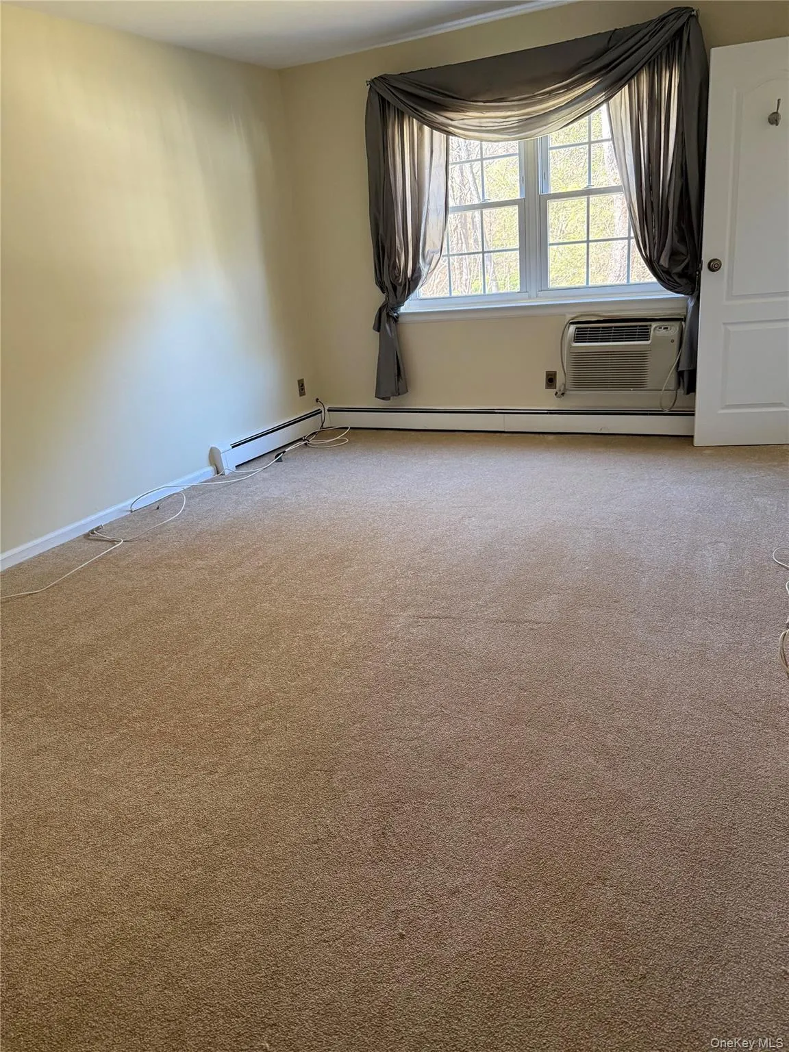 Primary bedroom with new carpet Primary bedroom with new carpet