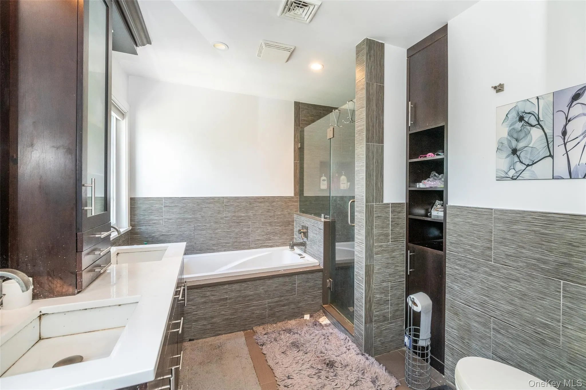 Vanity with crown molding, bath and shower Vanity with crown molding, bath and shower