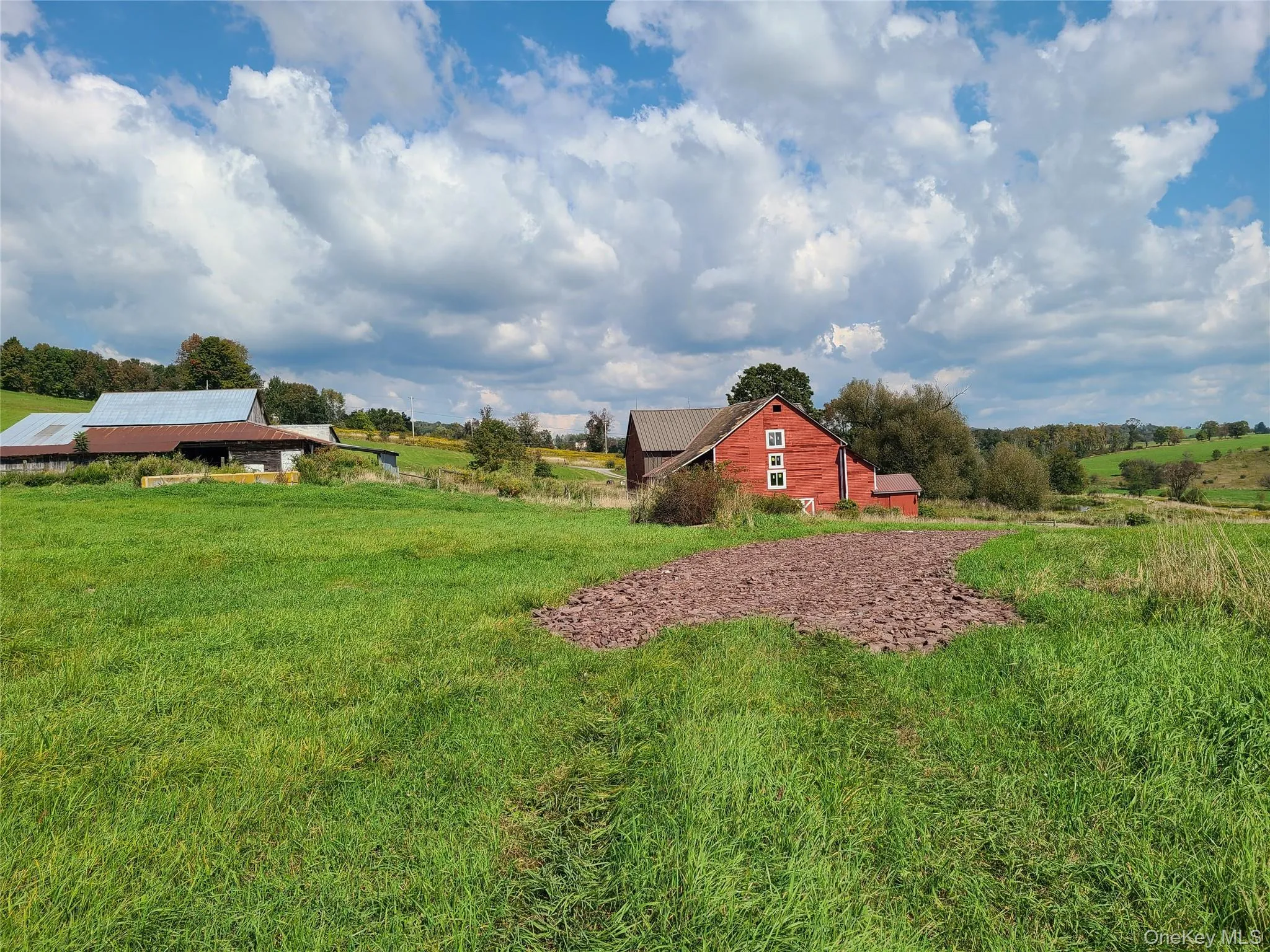 View of yard featuring a rural view and an outdoor structure View of yard featuring a rural view and an outdoor structure