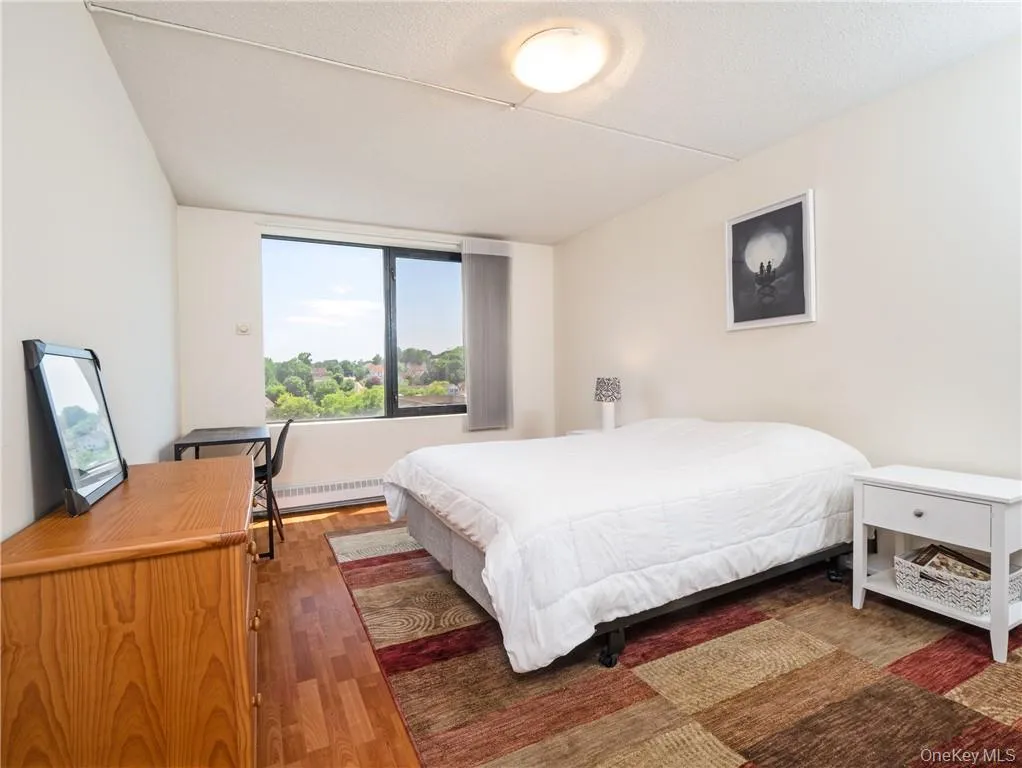 Large king-sized bedroom overlooks the peaceful gardens Large king-sized bedroom overlooks the peaceful gardens