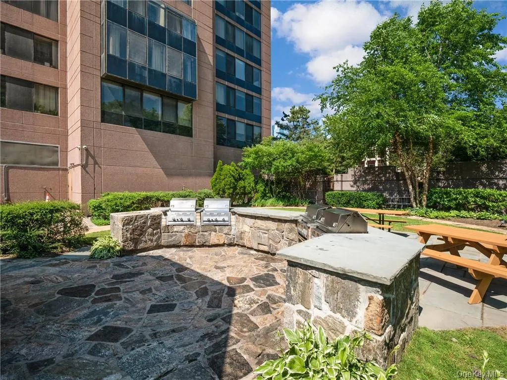 Outdoor BBQ area for resident cookouts and picnics Outdoor BBQ area for resident cookouts and picnics