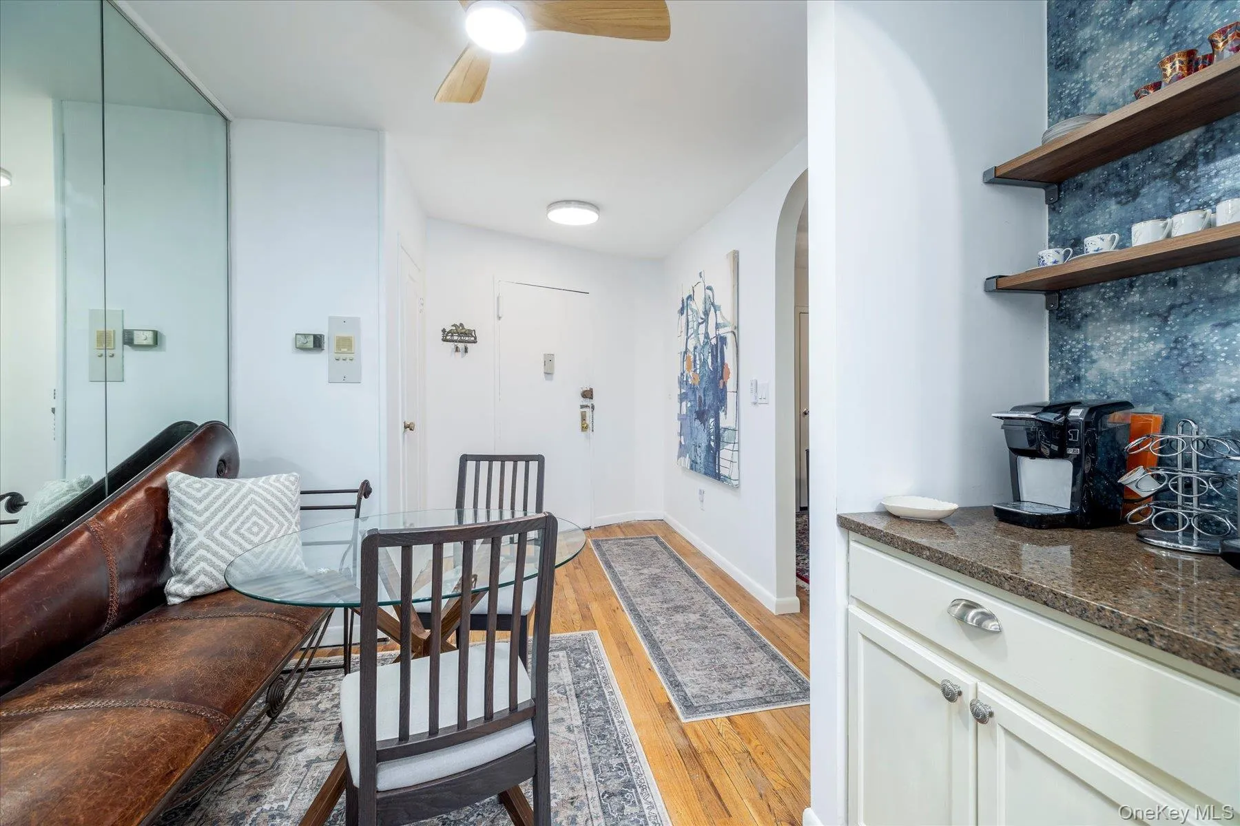 Breakfast space with ceiling fan and beverage bar Breakfast space with ceiling fan and beverage bar
