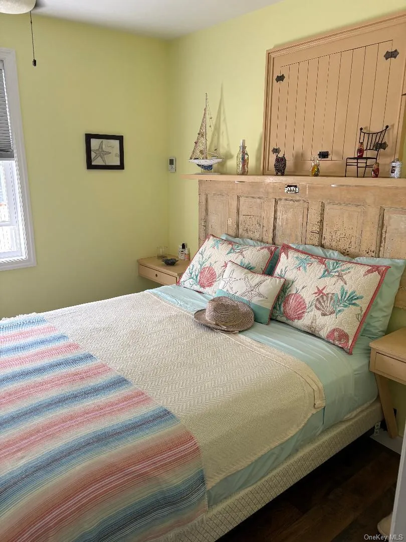 Bedroom with wood finished floors Bedroom with wood finished floors