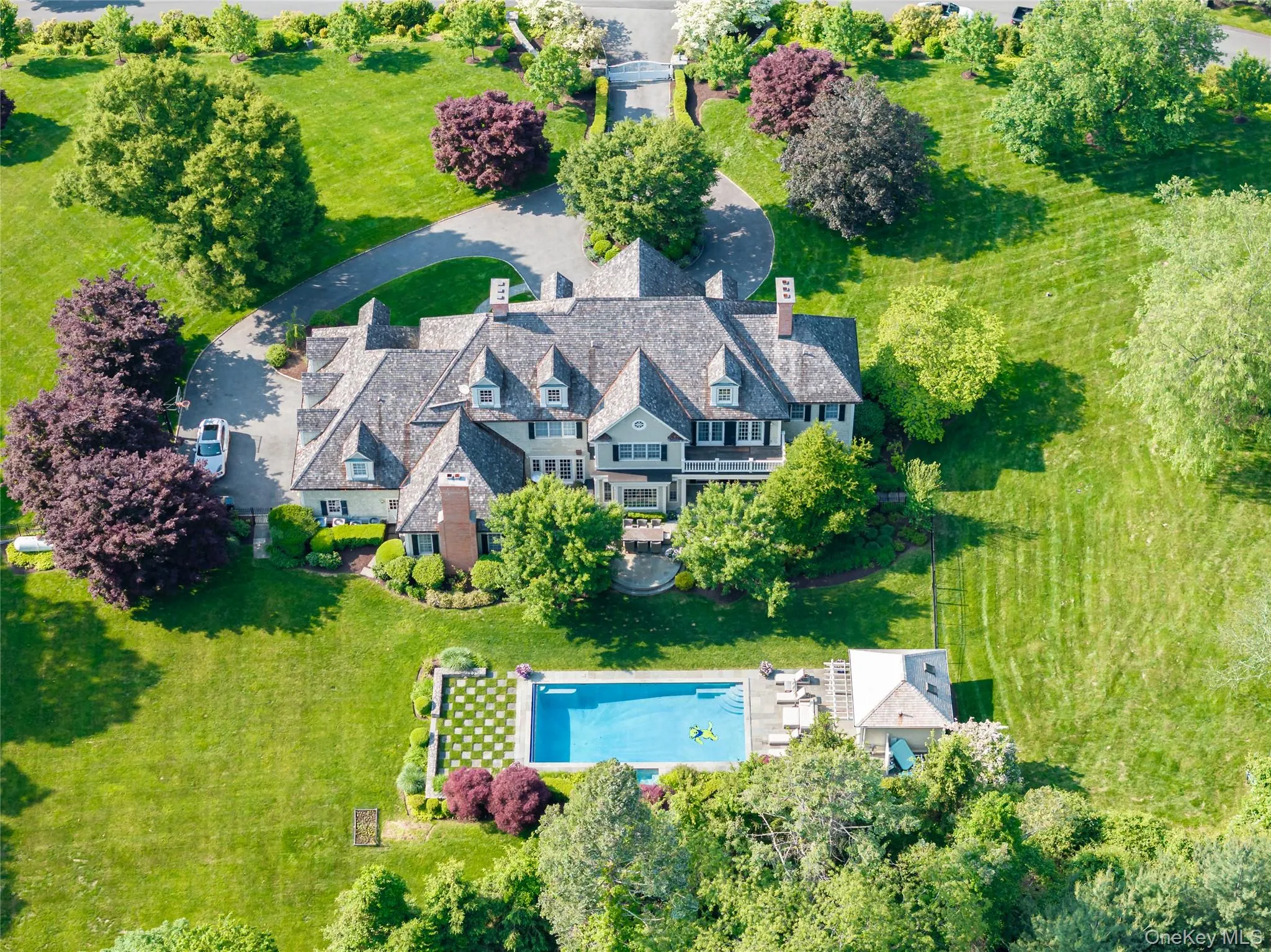 View from above of property featuring a pool area View from above of property featuring a pool area
