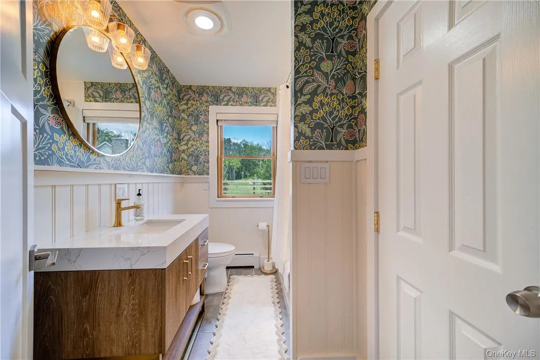 Lovely new bath finishes and new tile floor! Lovely new bath finishes and new tile floor!