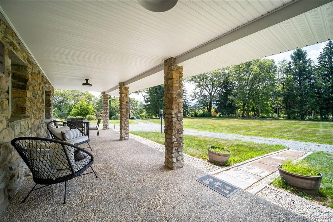 Oversized covered-front porch offers plenty of space for relaxing! Oversized covered-front porch offers plenty of space for relaxing!