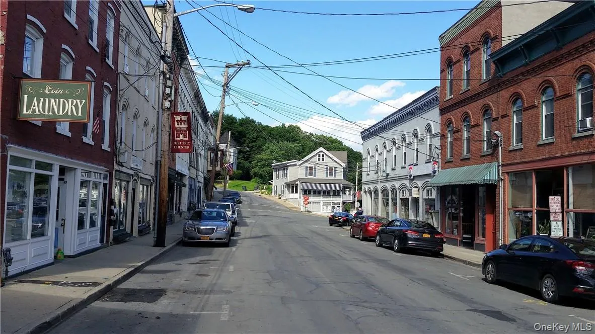 Village of Chester. Heritage Trail is in the distance within the wooded area. Village of Chester. Heritage Trail is in the distance within the wooded area.