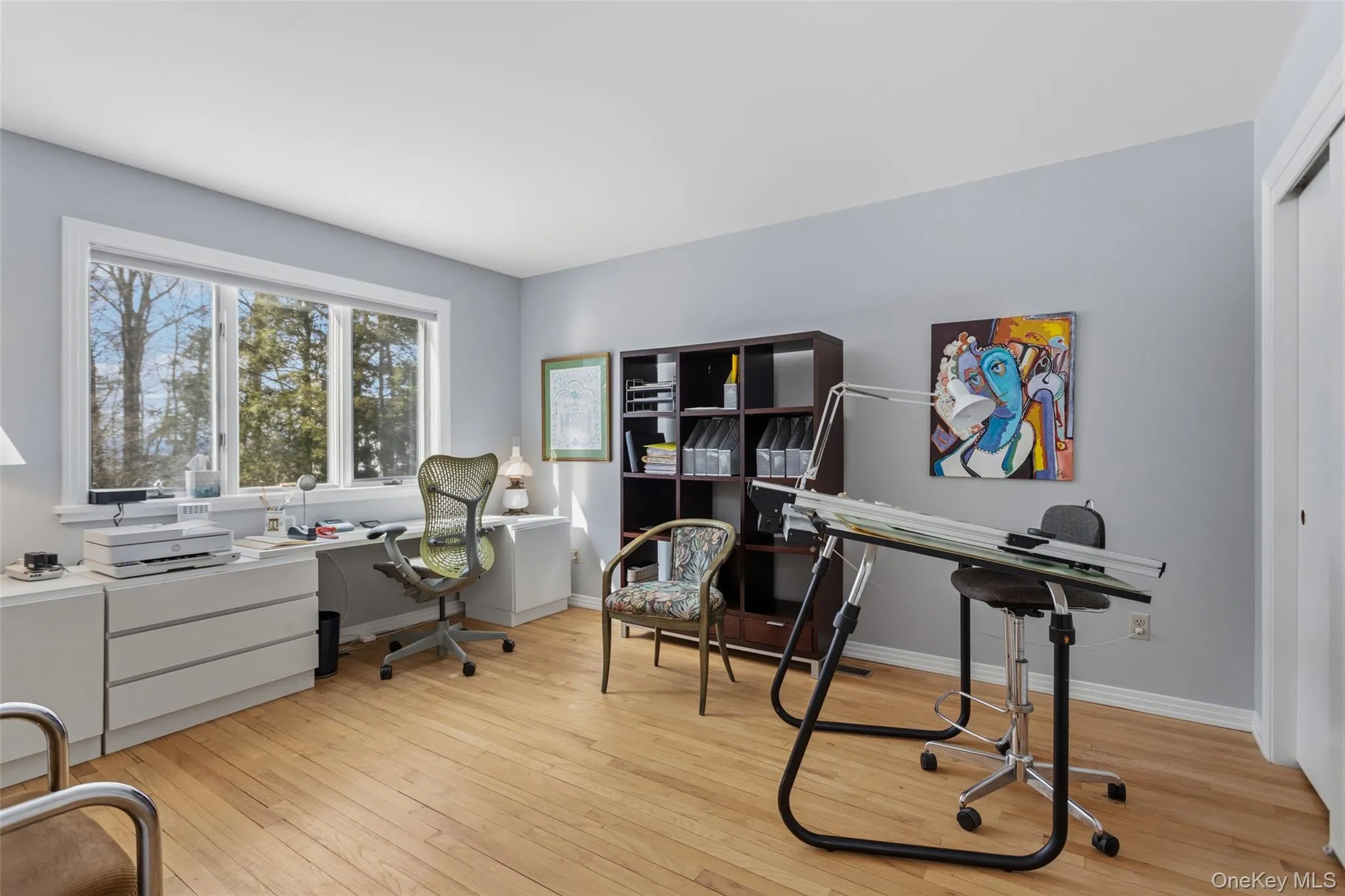 Guest bedroom being used as an office space Guest bedroom being used as an office space
