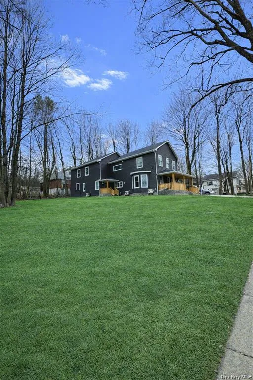 View of front facade featuring a front lawn View of front facade featuring a front lawn