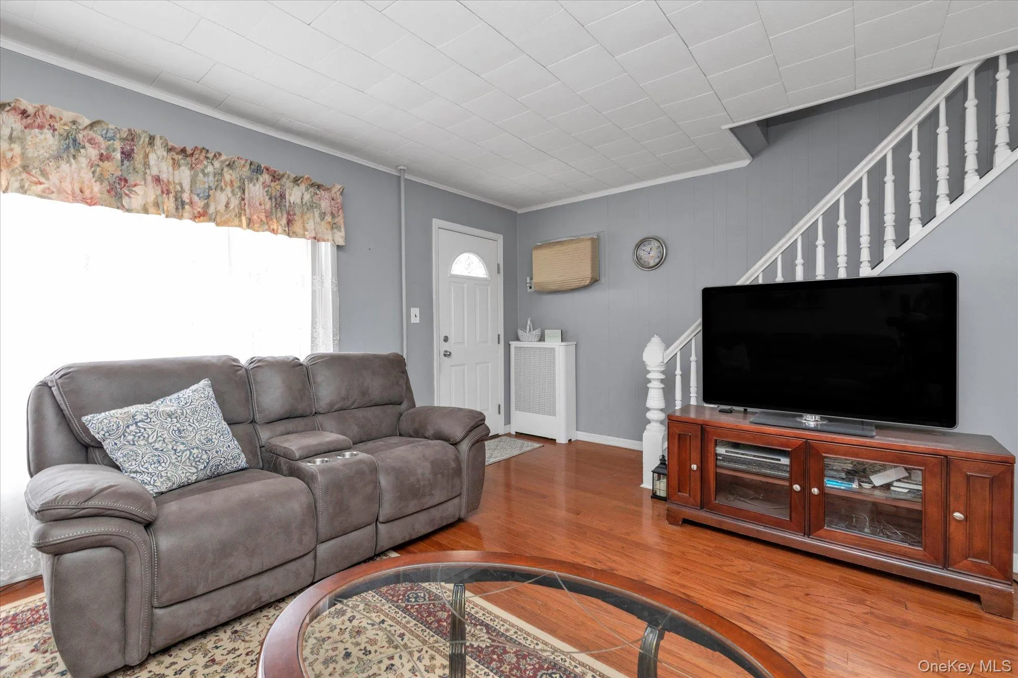 Front Living Room with Beautiful Hardwood Floors Front Living Room with Beautiful Hardwood Floors