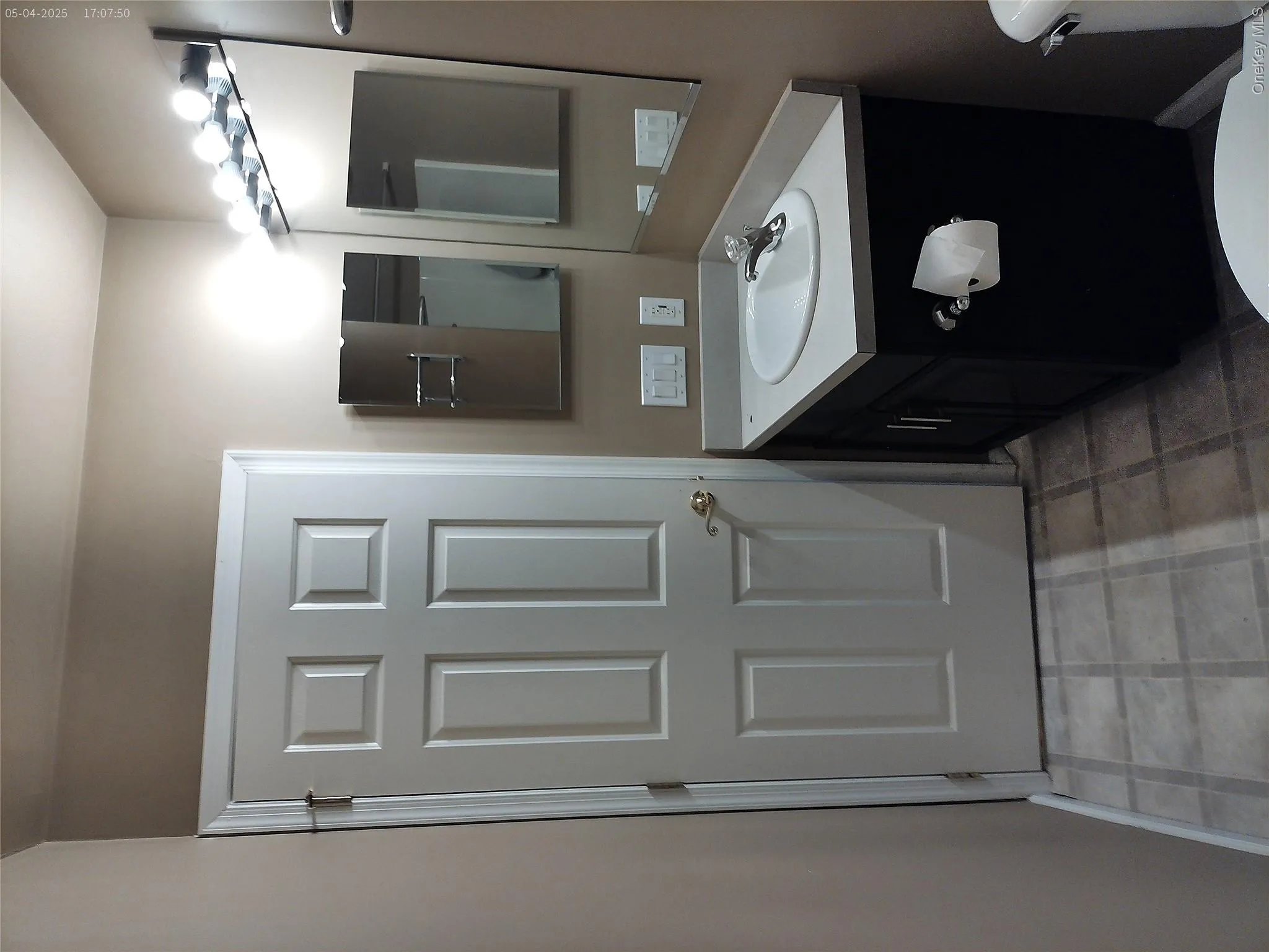 Bathroom featuring baseboards, toilet, and vanity Bathroom featuring baseboards, toilet, and vanity