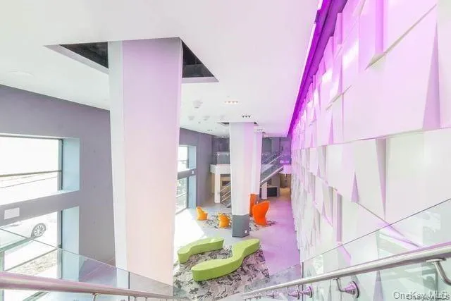 Recreation room featuring a towering ceiling, tile patterned floors, and billiards Recreation room featuring a towering ceiling, tile patterned floors, and billiards