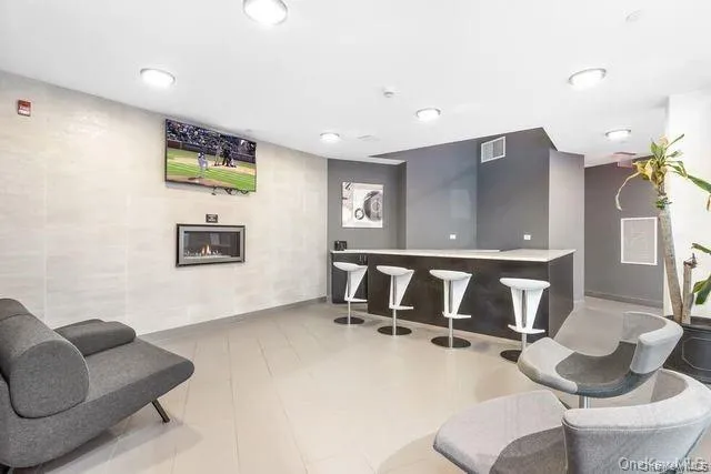 Reception area featuring indoor bar Reception area featuring indoor bar