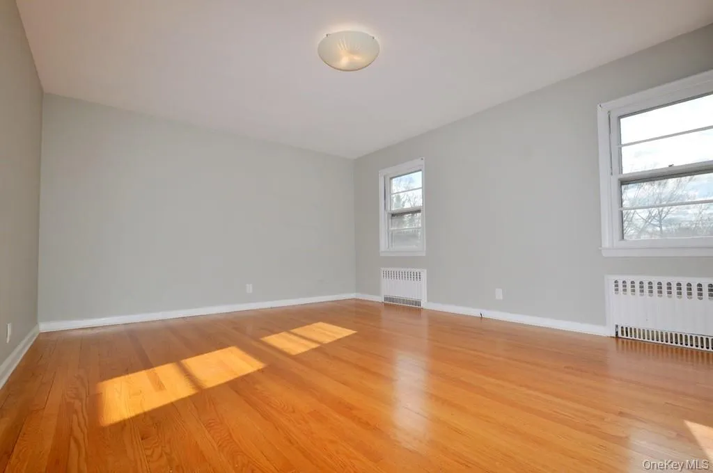 Large Living Room with Southern Exposure and refinished hardwood floors. Large Living Room with Southern Exposure and refinished hardwood floors.