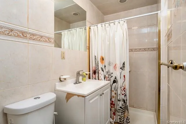 3rd Full bath on first floor with stall shower access to 3rd Full bath on first floor with stall shower access to