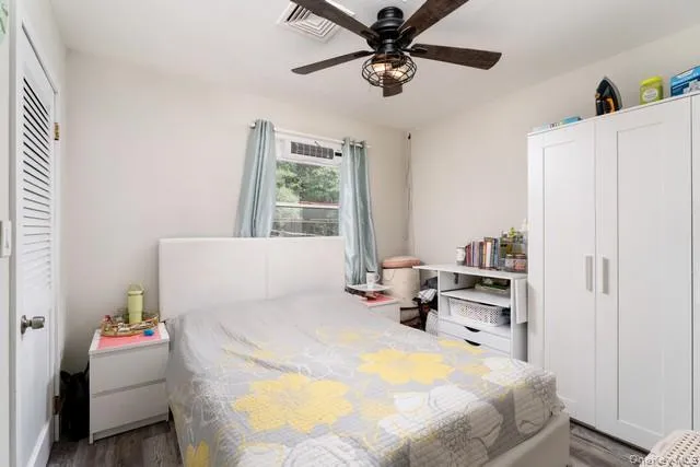 Bedroom Three with 2 closets, laminate flooring Bedroom Three with 2 closets, laminate flooring