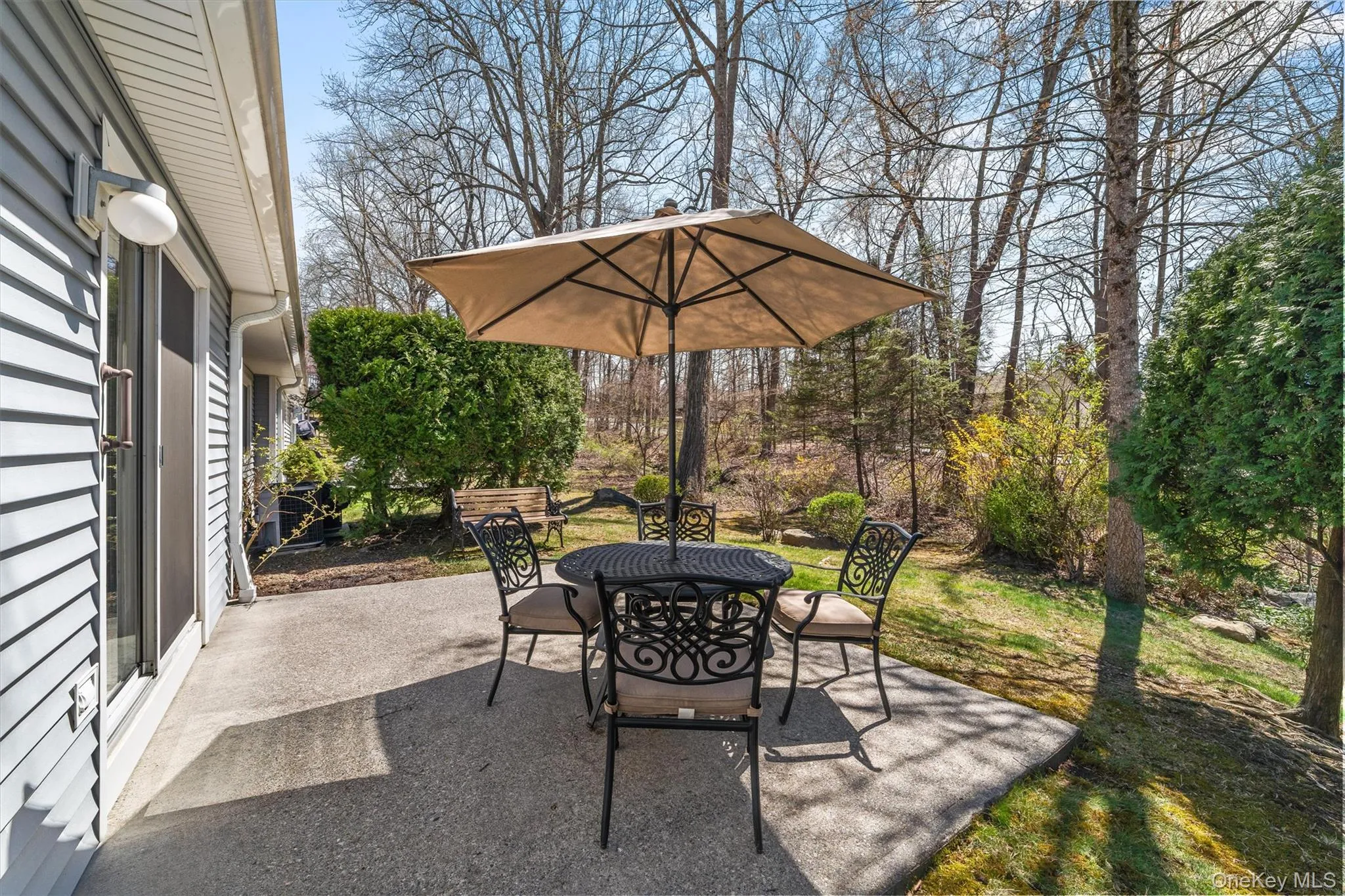 View of patio with privacy and lovely seasonal views . View of patio with privacy and lovely seasonal views .